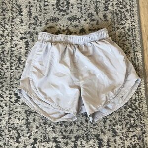 Gray Nike logo running shorts